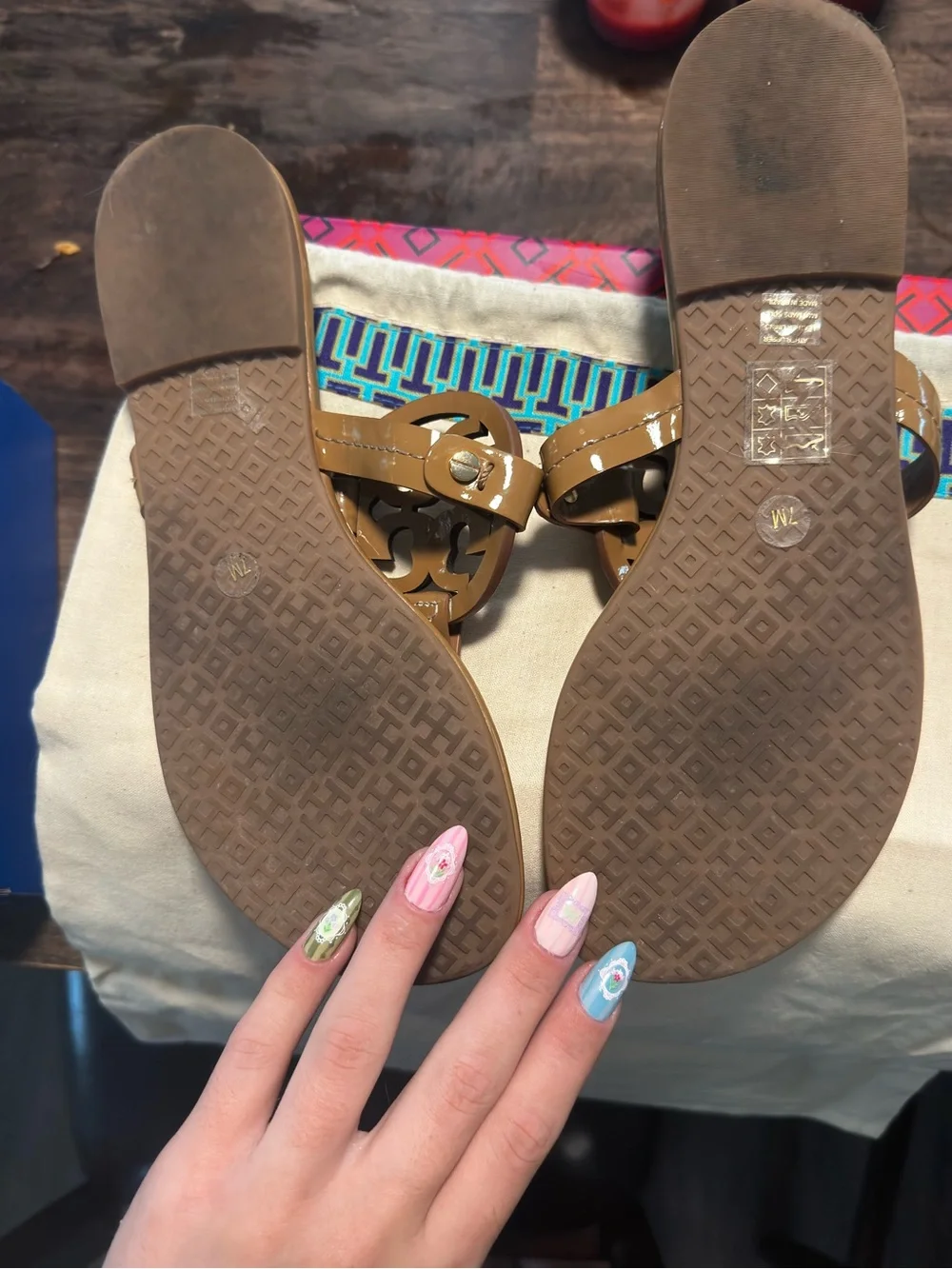 Tory Burch Patent Logo Thong Sandals in Tan